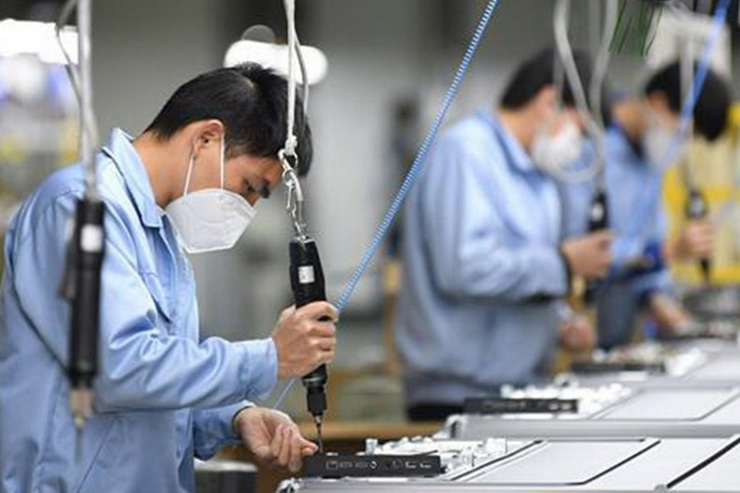Sản xuất công nghiệp tại Trung Quốc, công xưởng của thế giới đã bị ảnh hưởng nghiêm trọng vì sự bùng phát của virus Corona chủng mới. Ảnh Xinhua